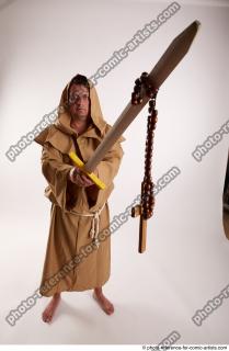 PAVEL MONK STANDING POSE WITH SWORD AND CRUCIFIX